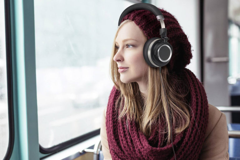 A digital nomad listening to podcasts while sitting on a bus.