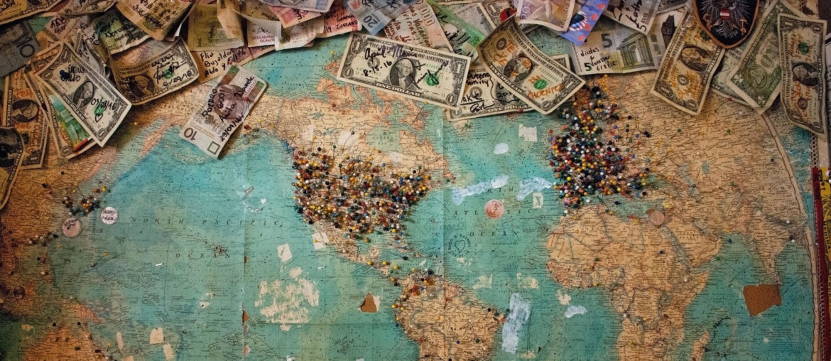 A budget-friendly map of the world covered in digital currency.