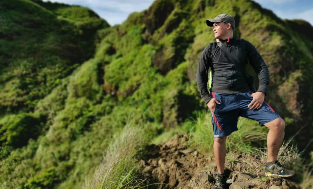 man hiking through the philippines