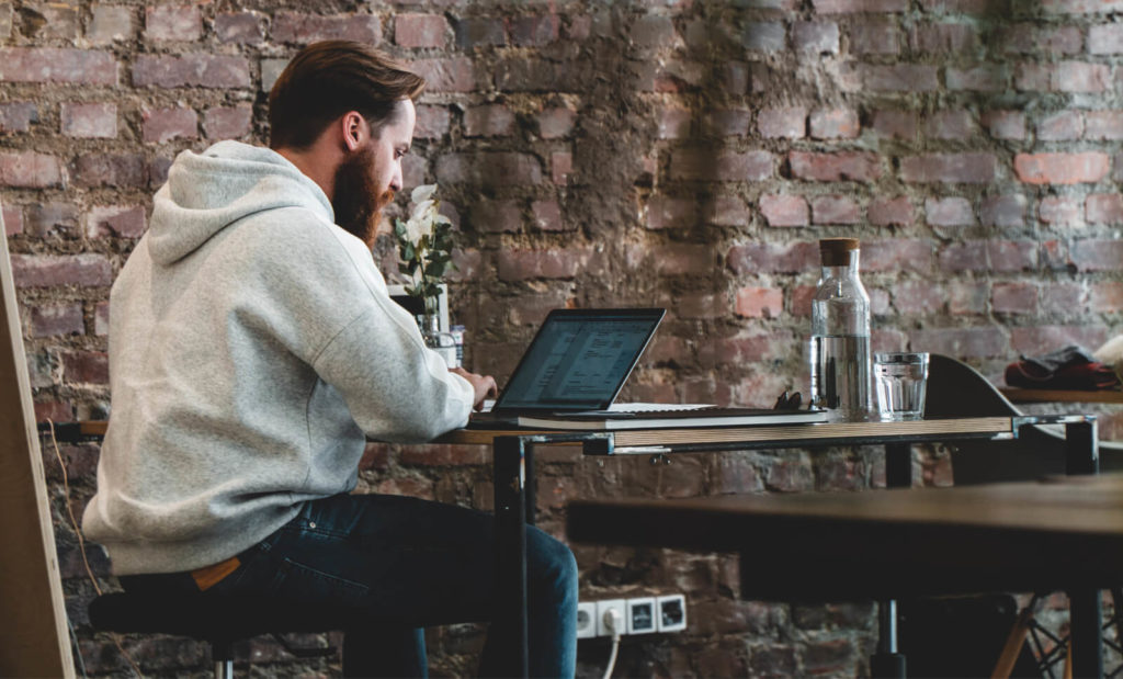 man working from a coworking space