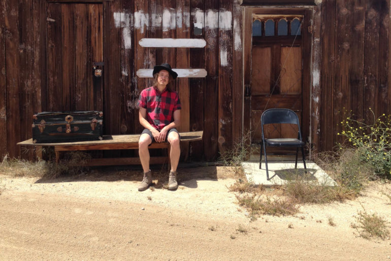 sitting on a bench outside