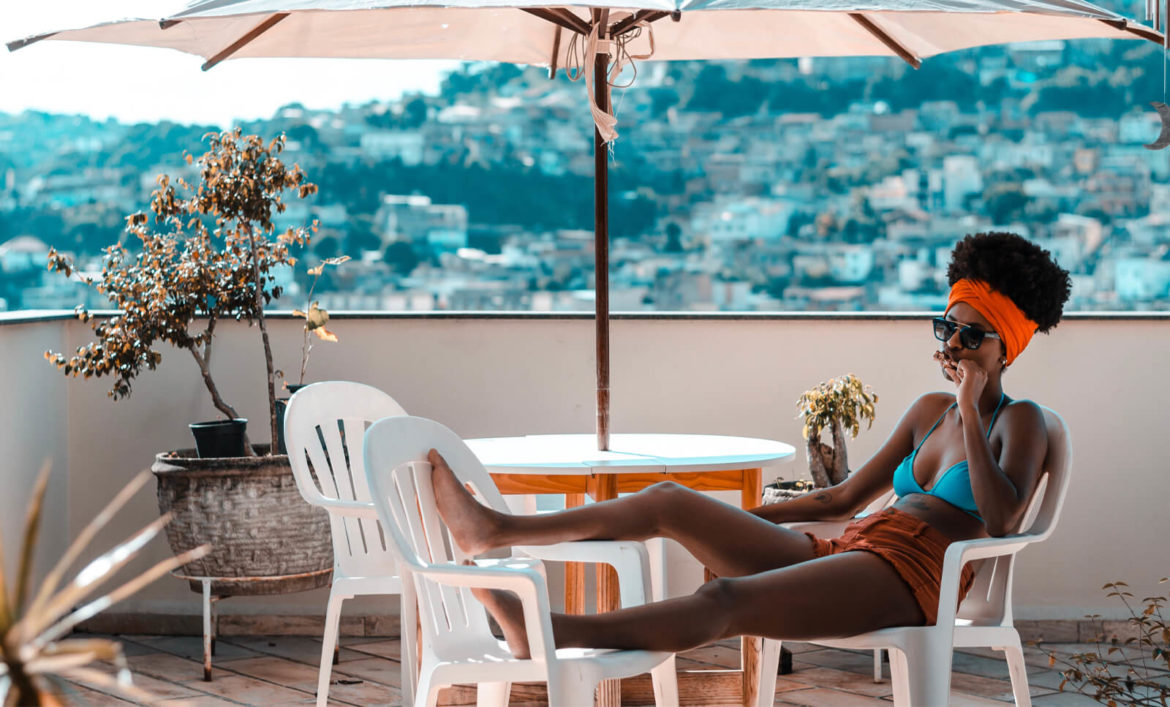 digital nomad relaxing on rooftop