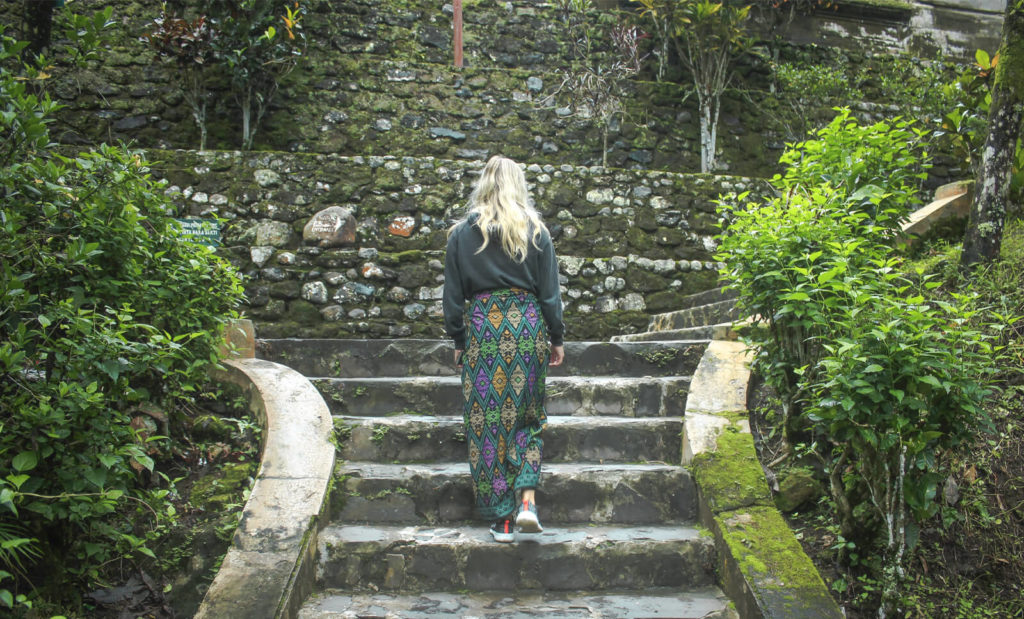 girl walking through bali