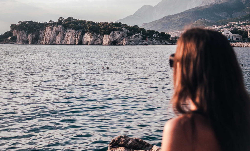 girl looking at the croatian coast