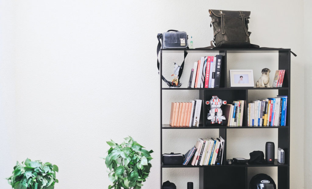 filling shelves with personal items