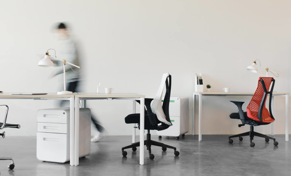 man exercising in his office