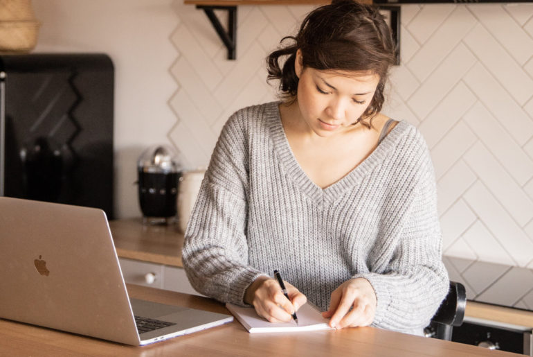 girl making her schedule at work