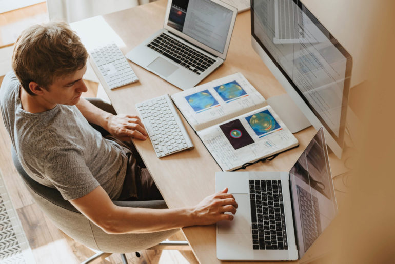 A remote-first man using a laptop.