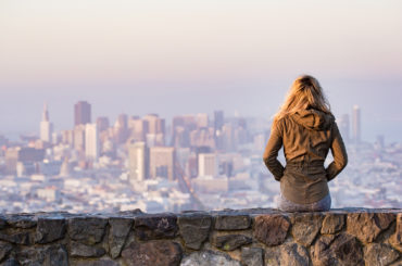 woman looking over NYC