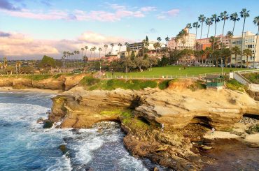 a scenic view of the ocean and a beach.