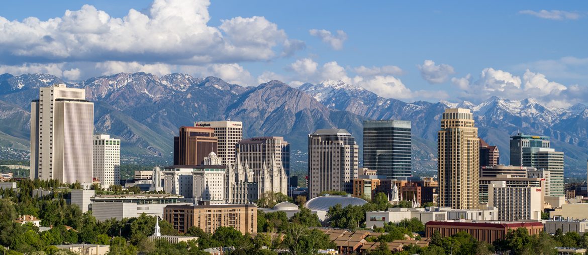 A workation destination featuring the stunning skyline of Denver framed by majestic mountains.